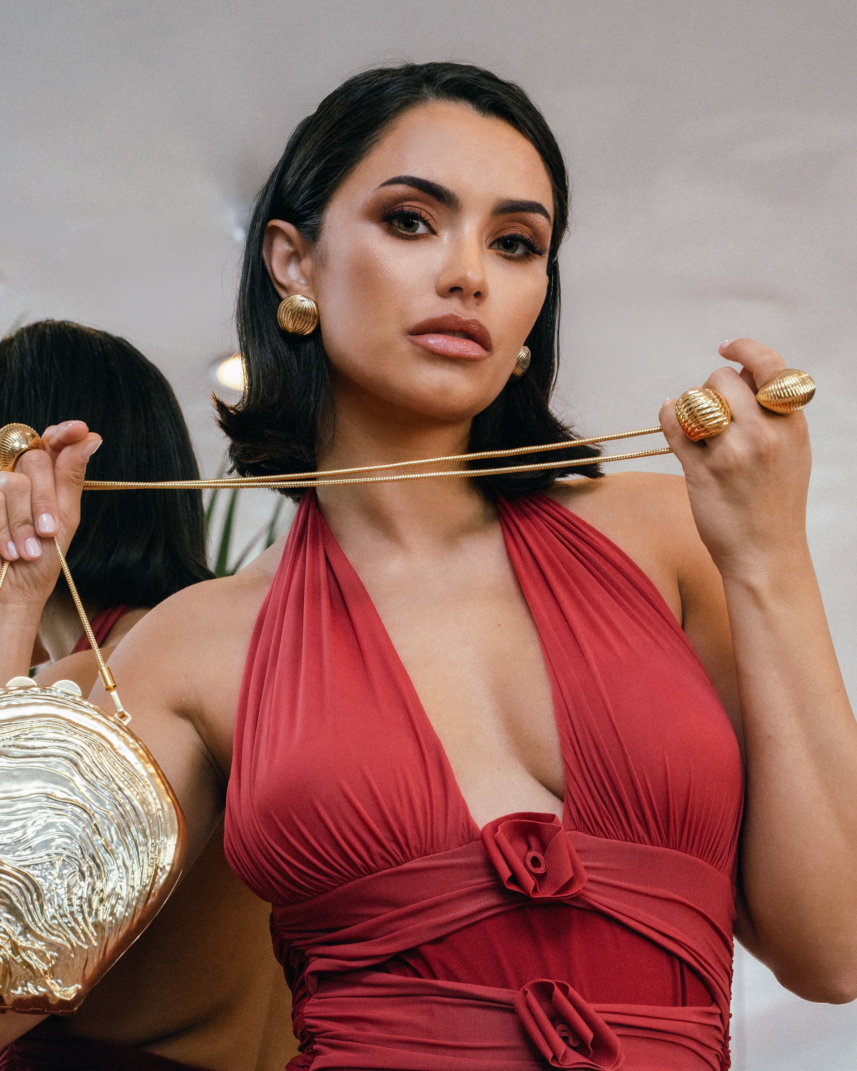 Model wearing Adriana Gold Earrings