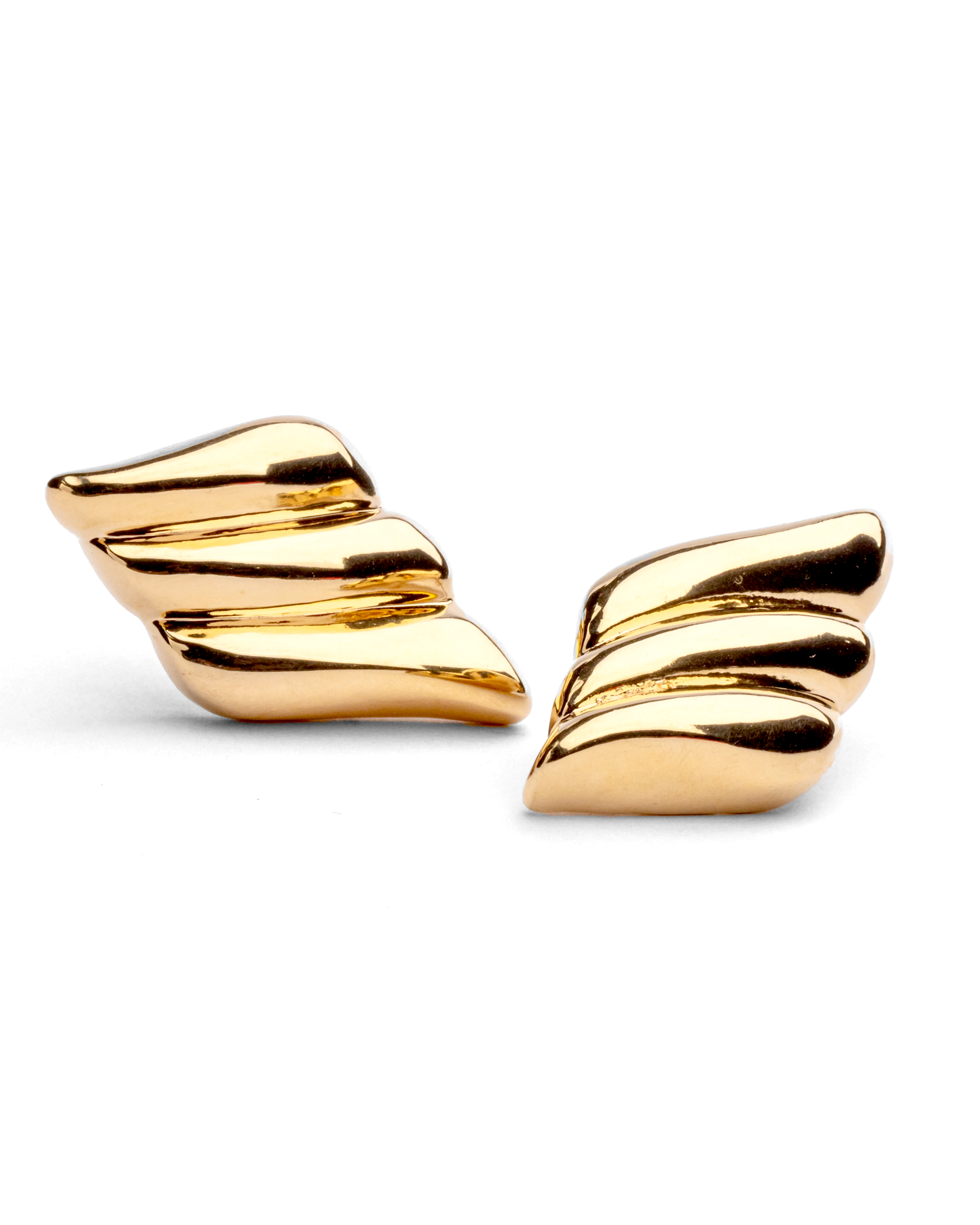 Gold plated wing-inspired earrings with sculptural curved design and elongated shape