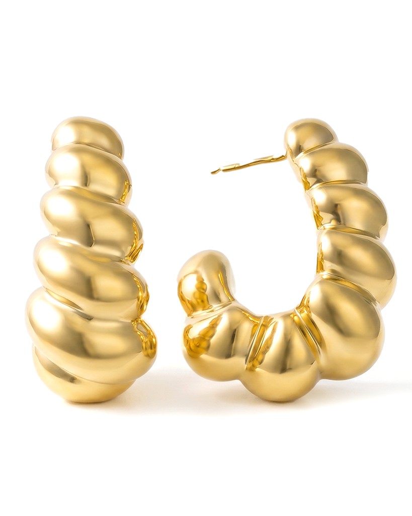 Gold plated sculptural earrings with smooth curved design and polished finish