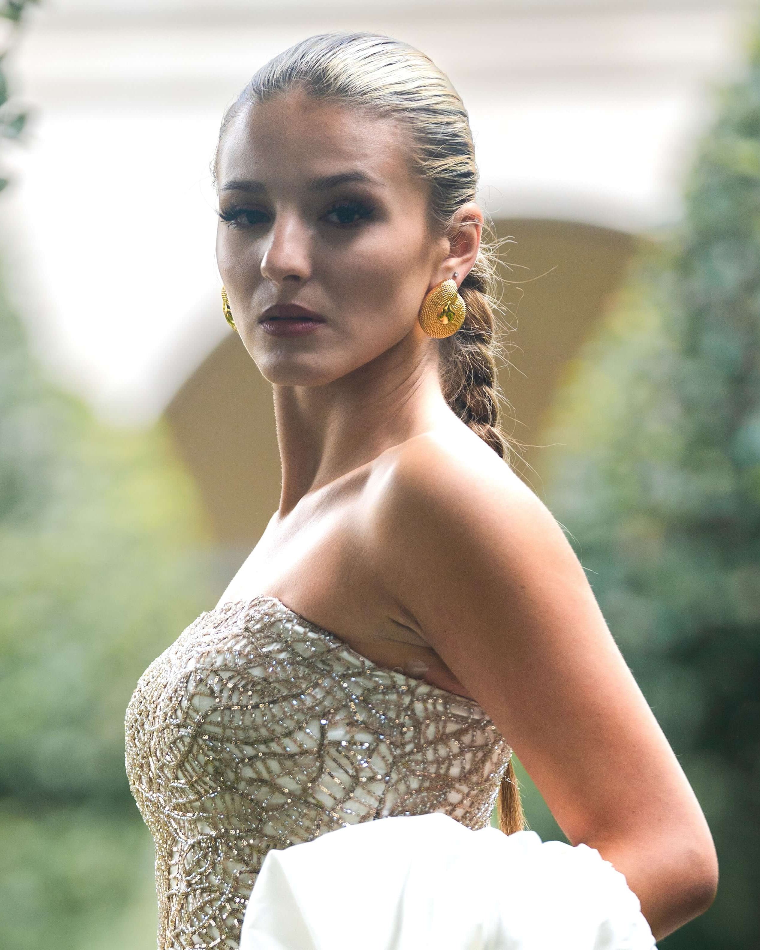 Model wearing Chiara Textured Dome Earrings