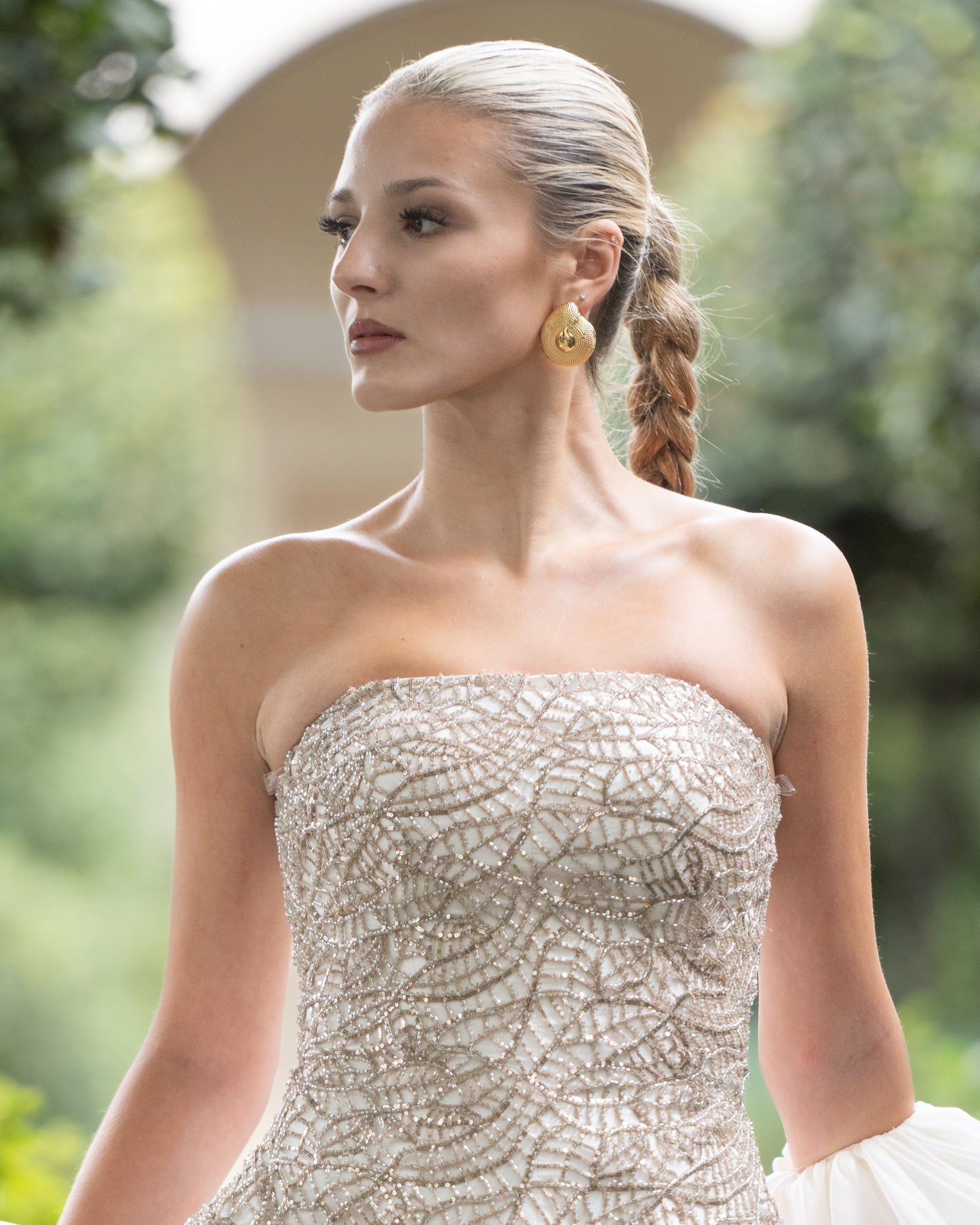 Model wearing Chiara Textured Dome Earrings
