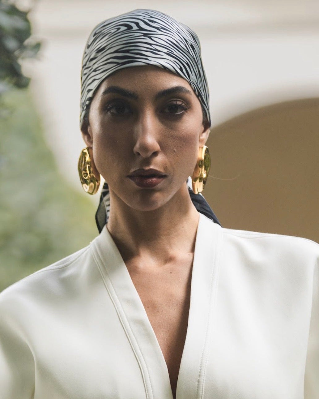 model wearing Clarice Maxi Abstract Oval Earrings
