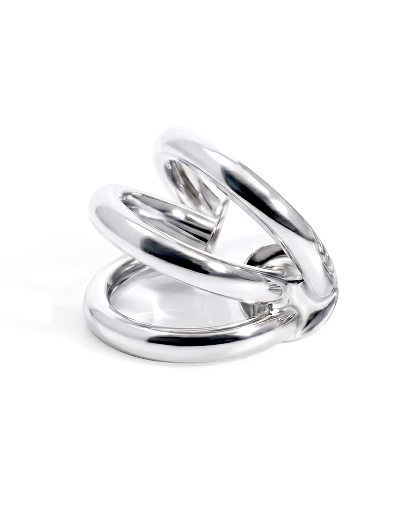 Triple strand ear cuff available in gold plated and rhodium plated finishes with sculptural layered design