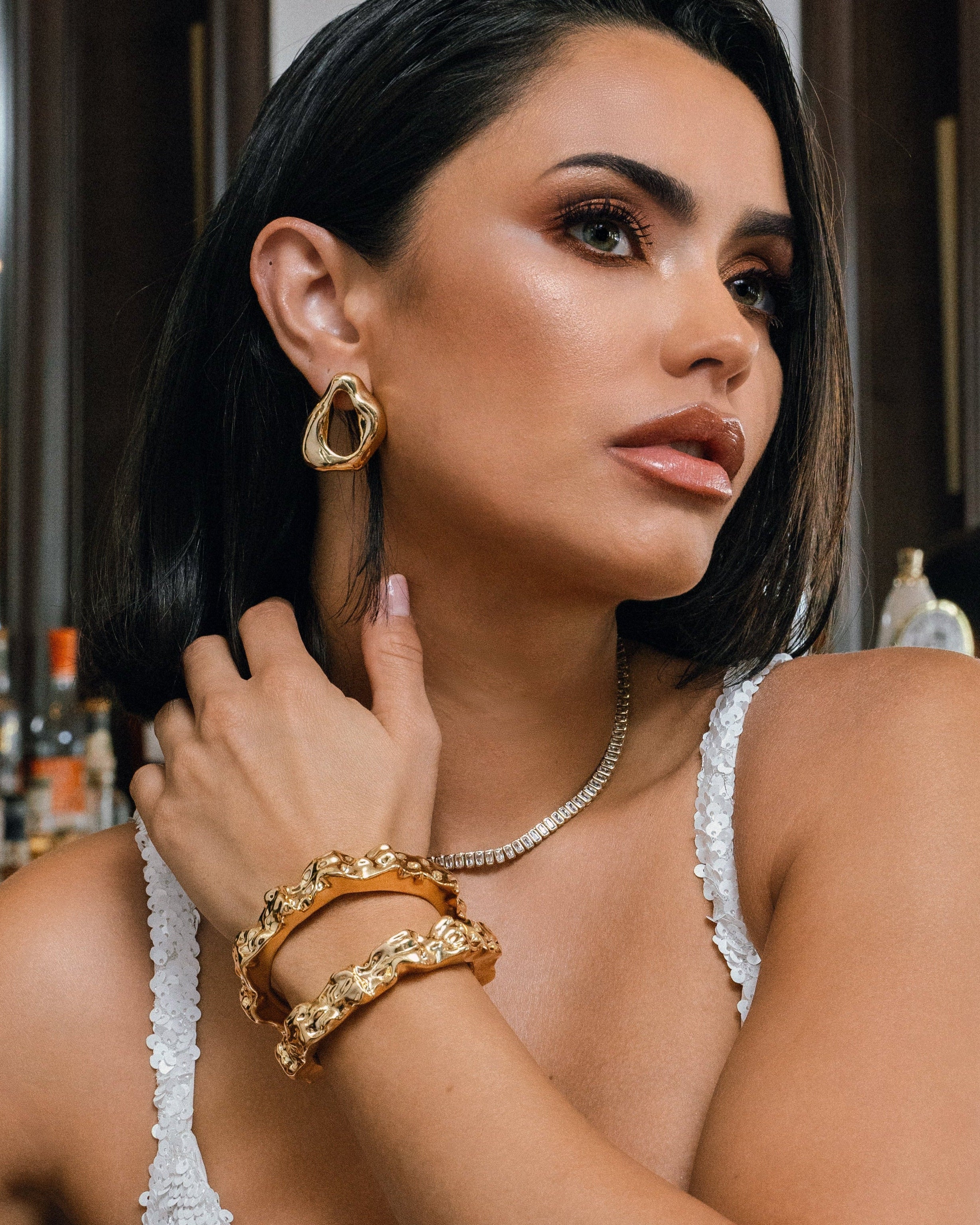 model wearing Chanda Gold Earrings
