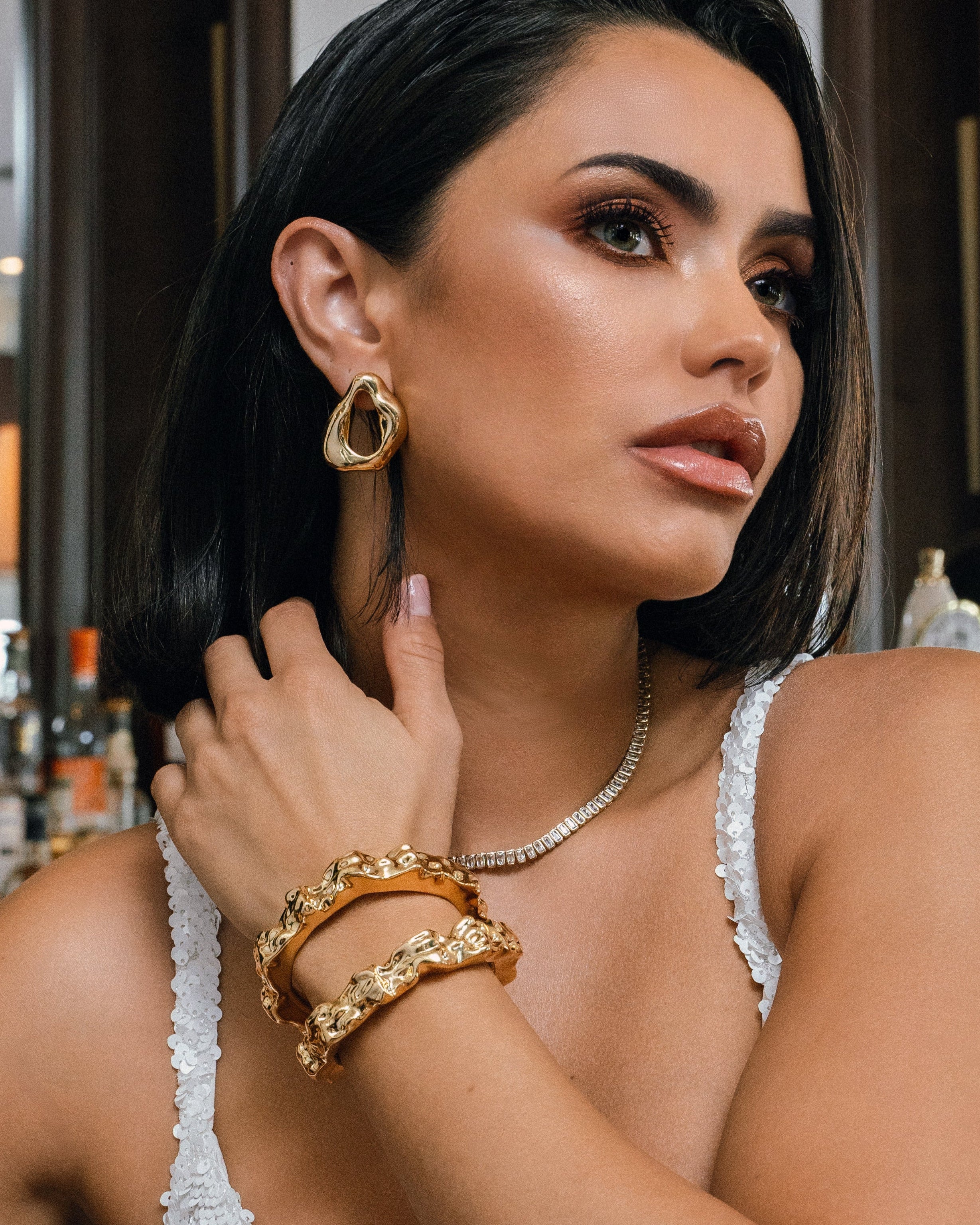 model wearing Chanda Gold Earrings