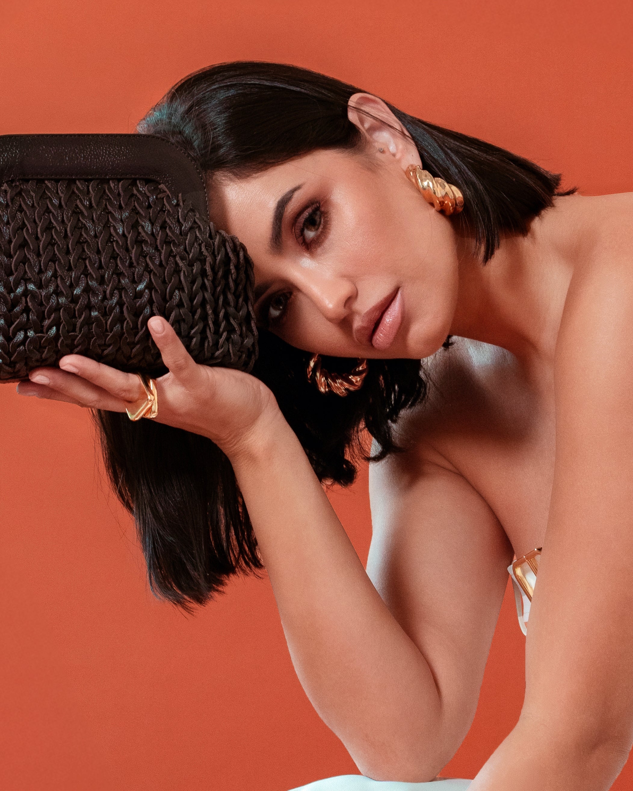 model wearing Alessandra Gold Hoops