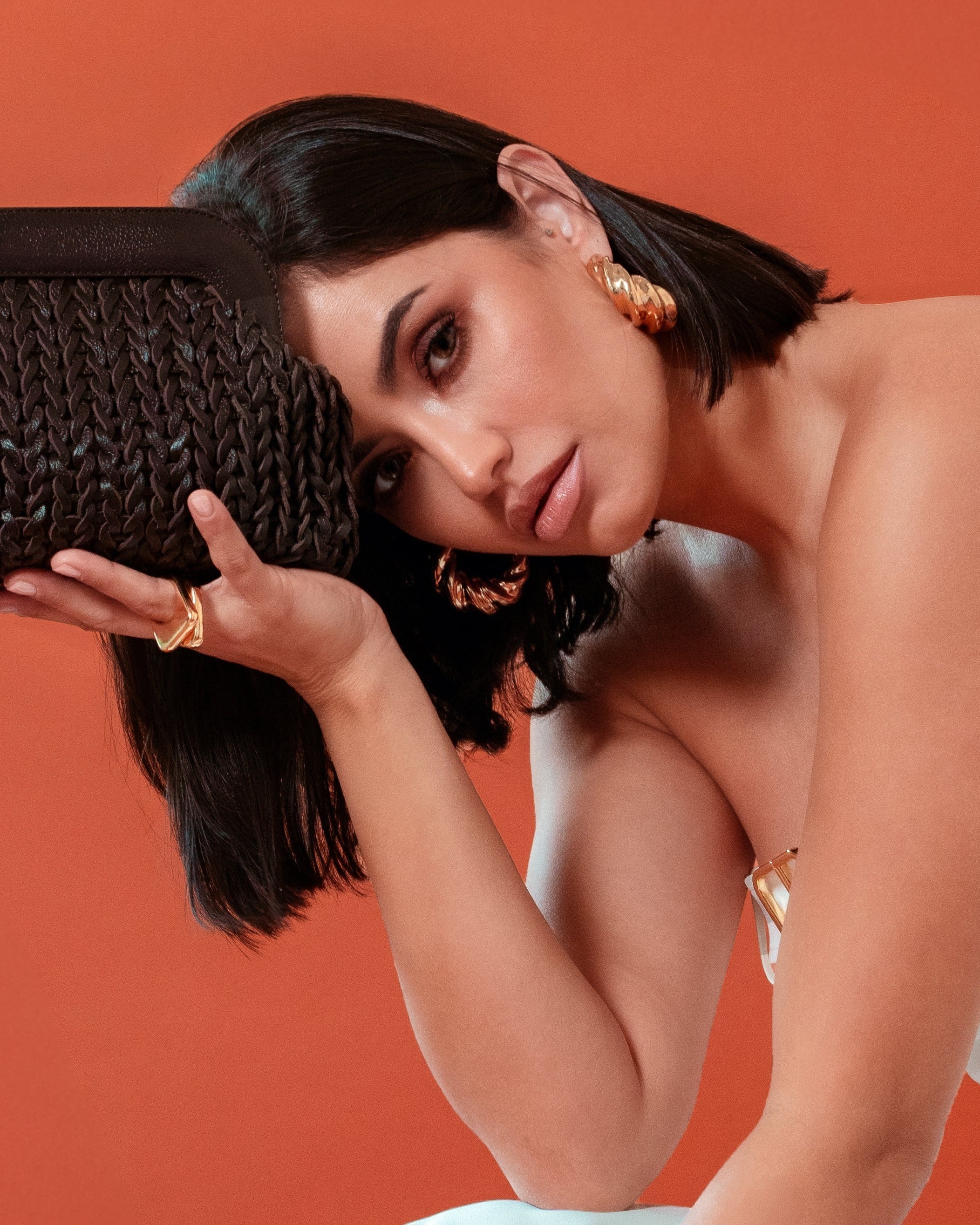 model wearing Alessandra Gold Hoops