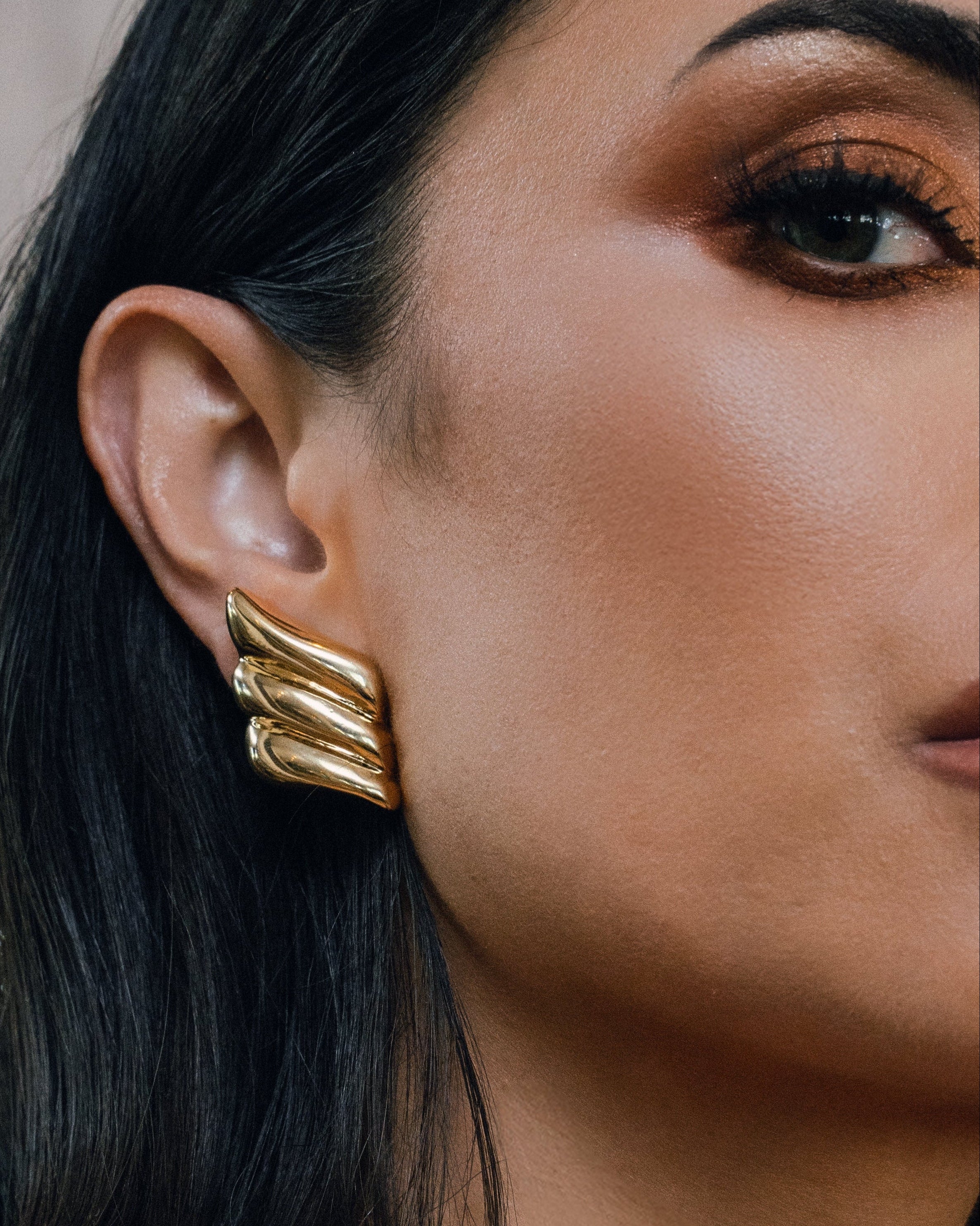 model wearing Amelie Gold Earrings