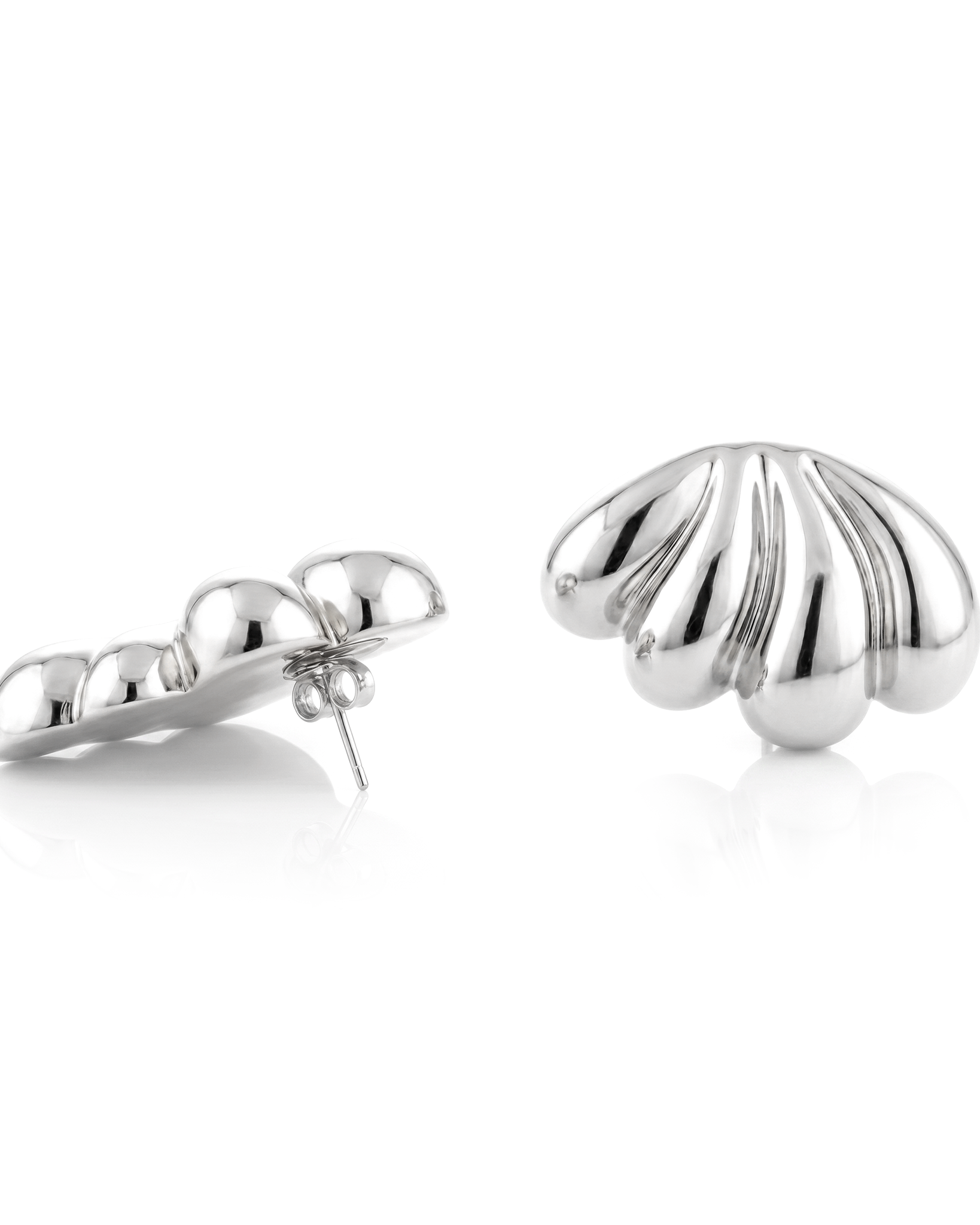 Silver plated fan-shaped earrings with layered radiating design and polished finish, 46mm by 30mm