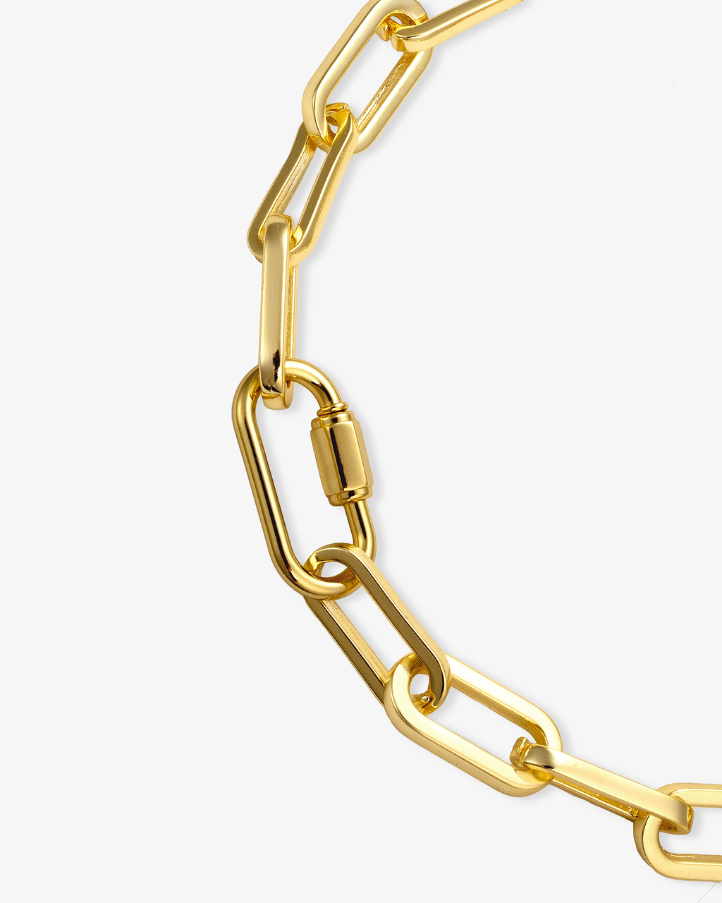 Gold paperclip chain necklace close-up with carabiner clasp