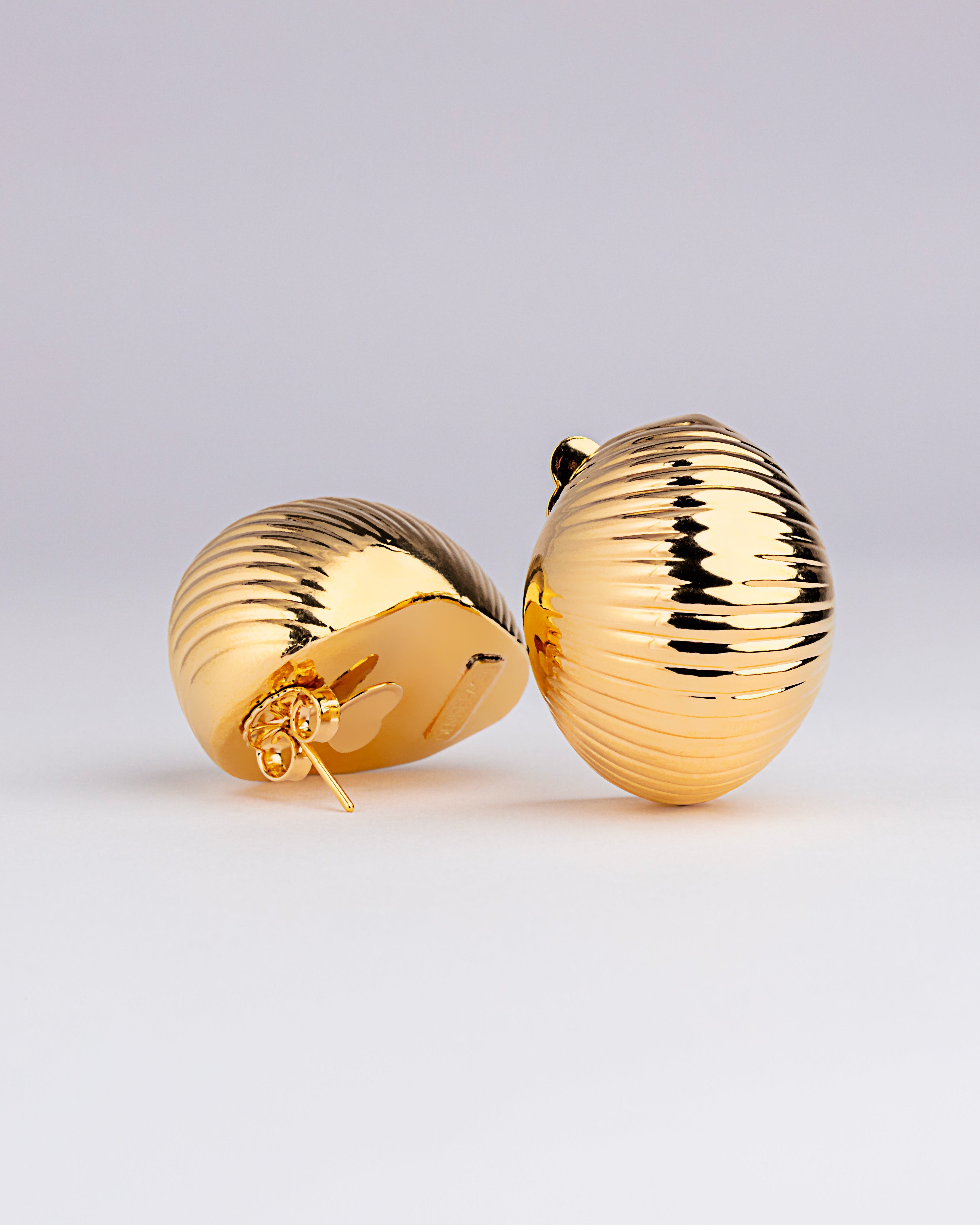 Gold plated dome earrings with textured surface and rounded compact design