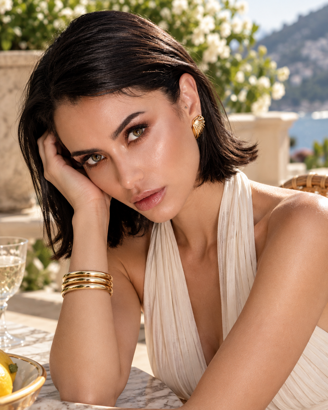 a model wearing a Fluted shell gold statement earrings