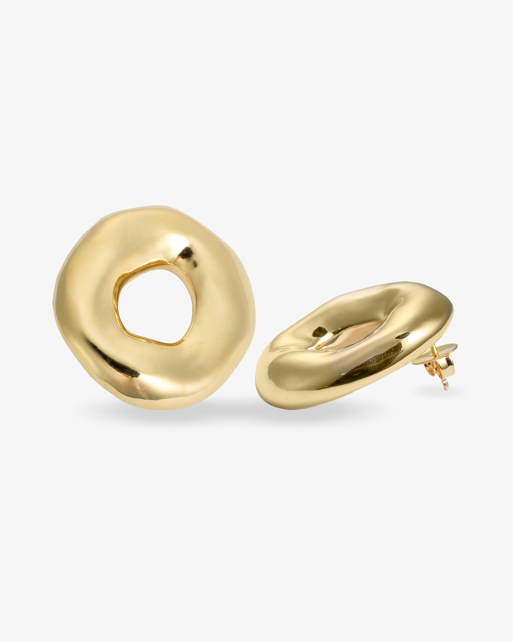 Sculptural donut-shaped gold earrings angled view with post backs