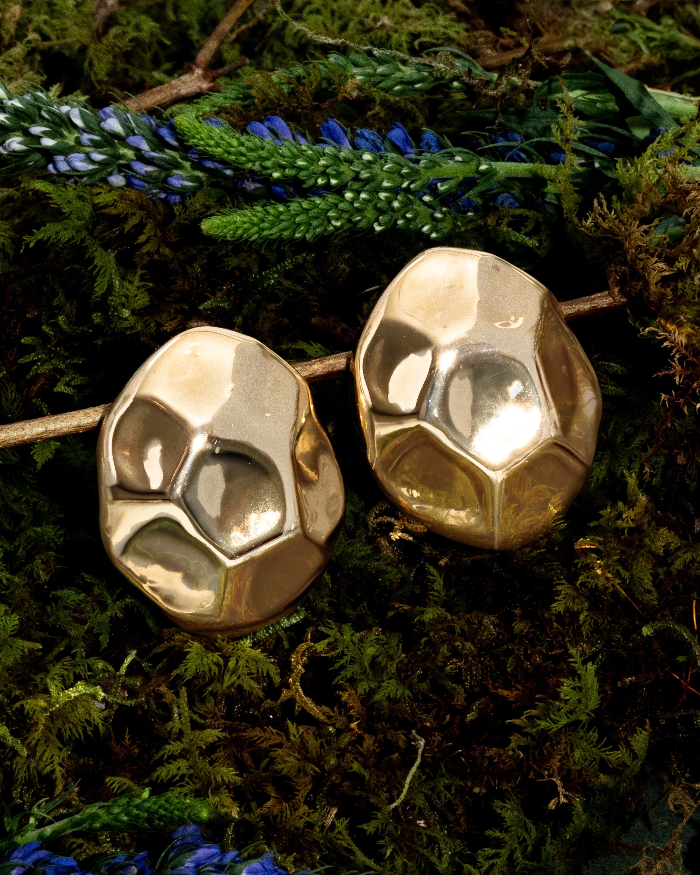 Gold dome earrings with organic sculptural shape and polished curved surface
