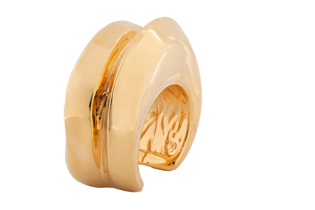 Gold plated wide cuff bracelet with open structured design and smooth polished surface, 40mm