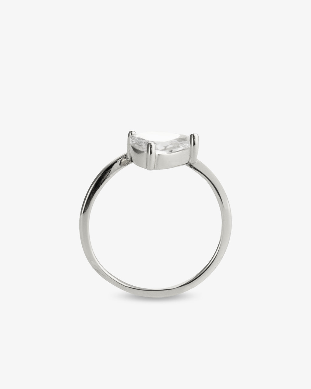 Silver pear-shaped simulated diamond pinky ring, alone product shot from a top-down angle.