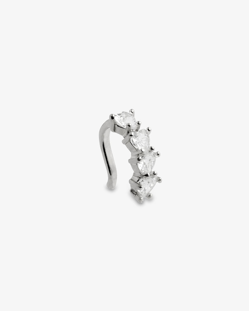 Silver sculptural pave climber ear cuff, alone product shot from a curved angle.