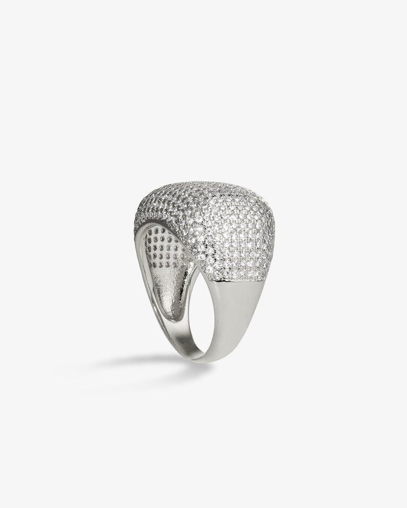 Silver wide band pave simulated diamond ring, alone product shot on a plain background.
