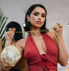 Model wearing Adriana Gold Earrings