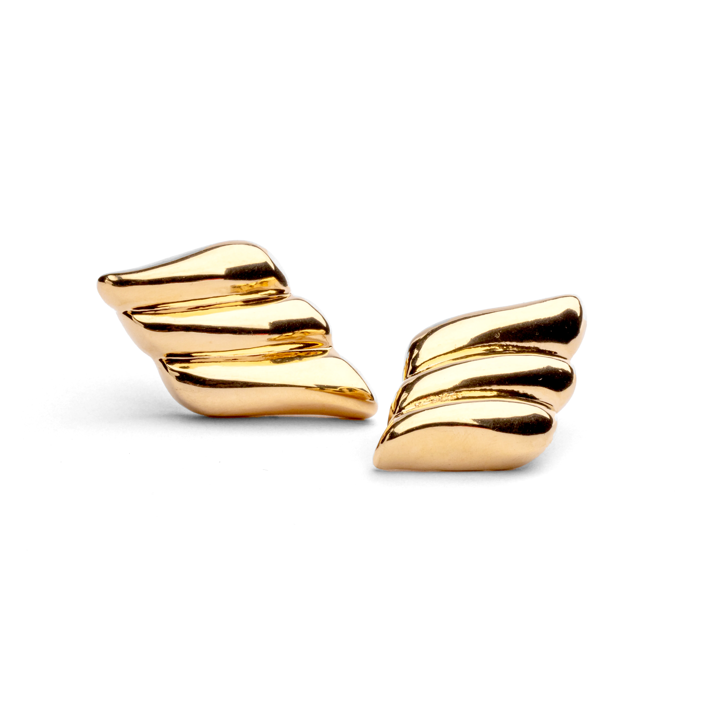 Gold plated wing-inspired earrings with sculptural curved design and elongated shape