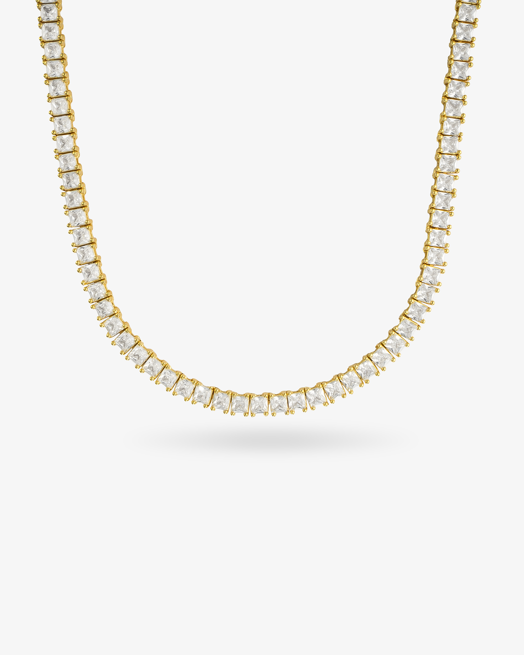 Gold square simulated diamond tennis necklace, alone product shot on a plain background.