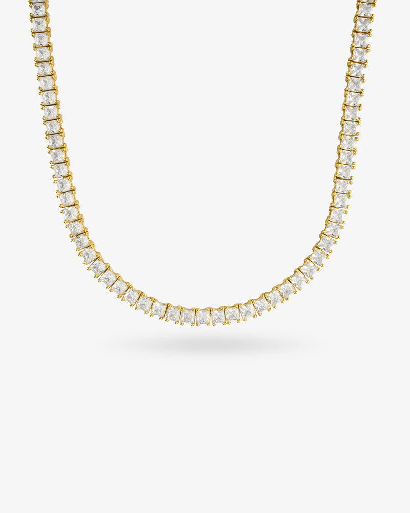 Gold square simulated diamond tennis necklace, alone product shot on a plain background.