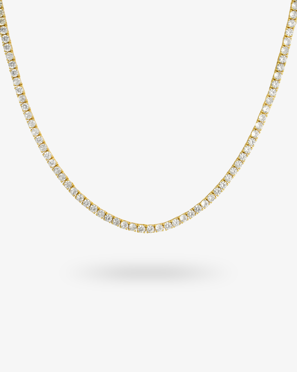 Gold round simulated diamond tennis necklace, alone product shot on a plain background.