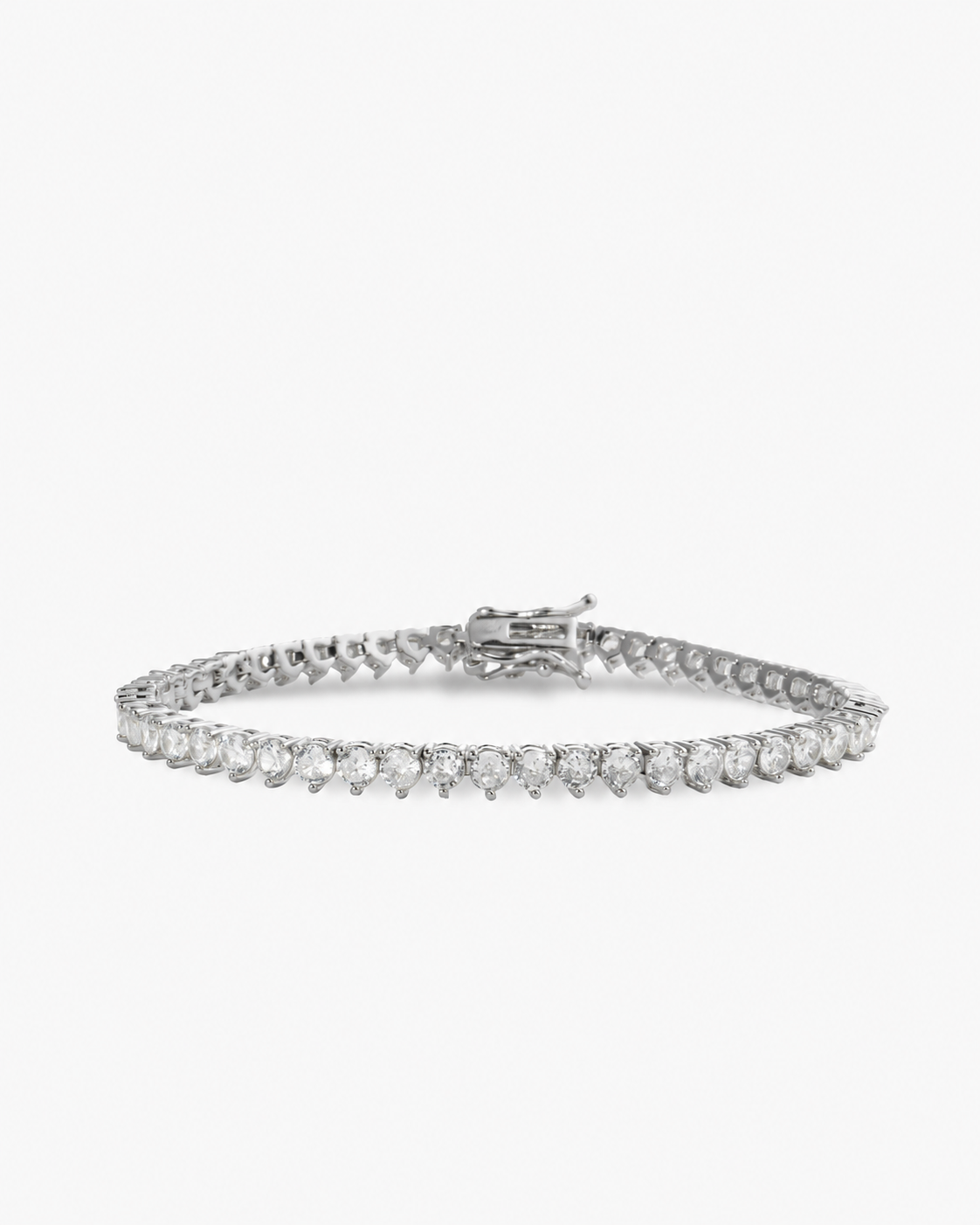 Silver three-prong simulated diamond tennis bracelet, alone product shot on a plain background.
