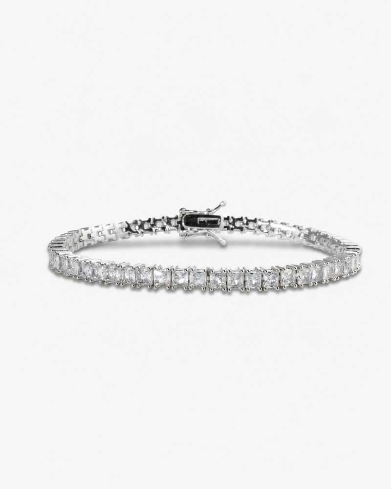 Silver square-cut simulated diamond tennis bracelet, alone product shot on a plain background.