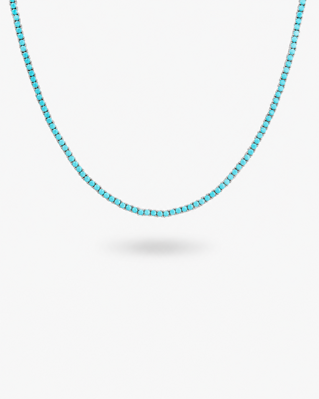 Silver tennis necklace with multicolor simulated diamond stones, alone product shot from a different angle.