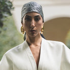 model wearing Clarice Maxi Abstract Oval Earrings