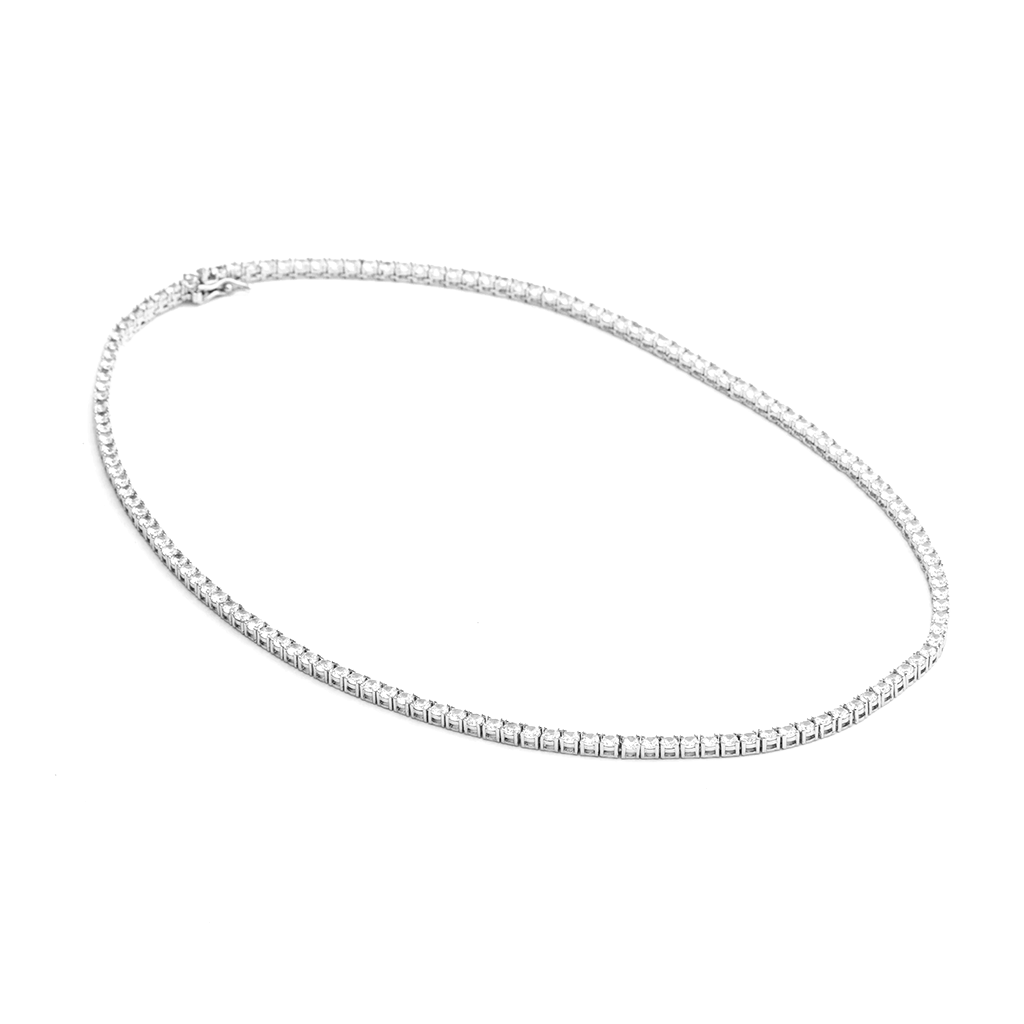 Tennis necklace and bracelet set with cubic zirconia stones available in gold plated and rhodium finishes