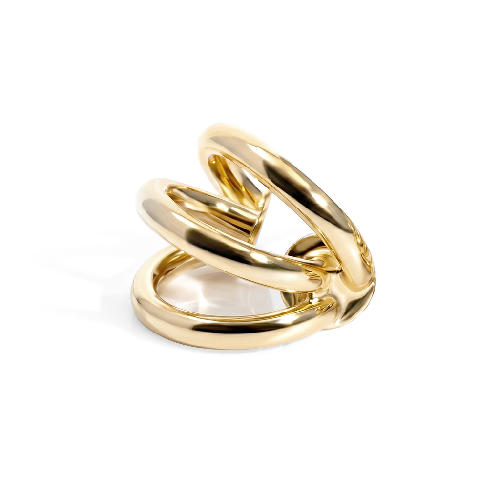 Triple strand ear cuff available in gold plated and rhodium plated finishes with sculptural layered design