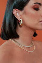 model wearing Ana Gold Hoops