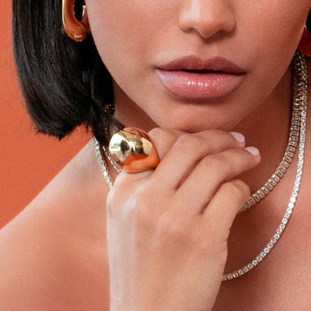 Model wearing Amanda Sculptural Dome Ring — 18K gold-plated rings by Denise Pacini