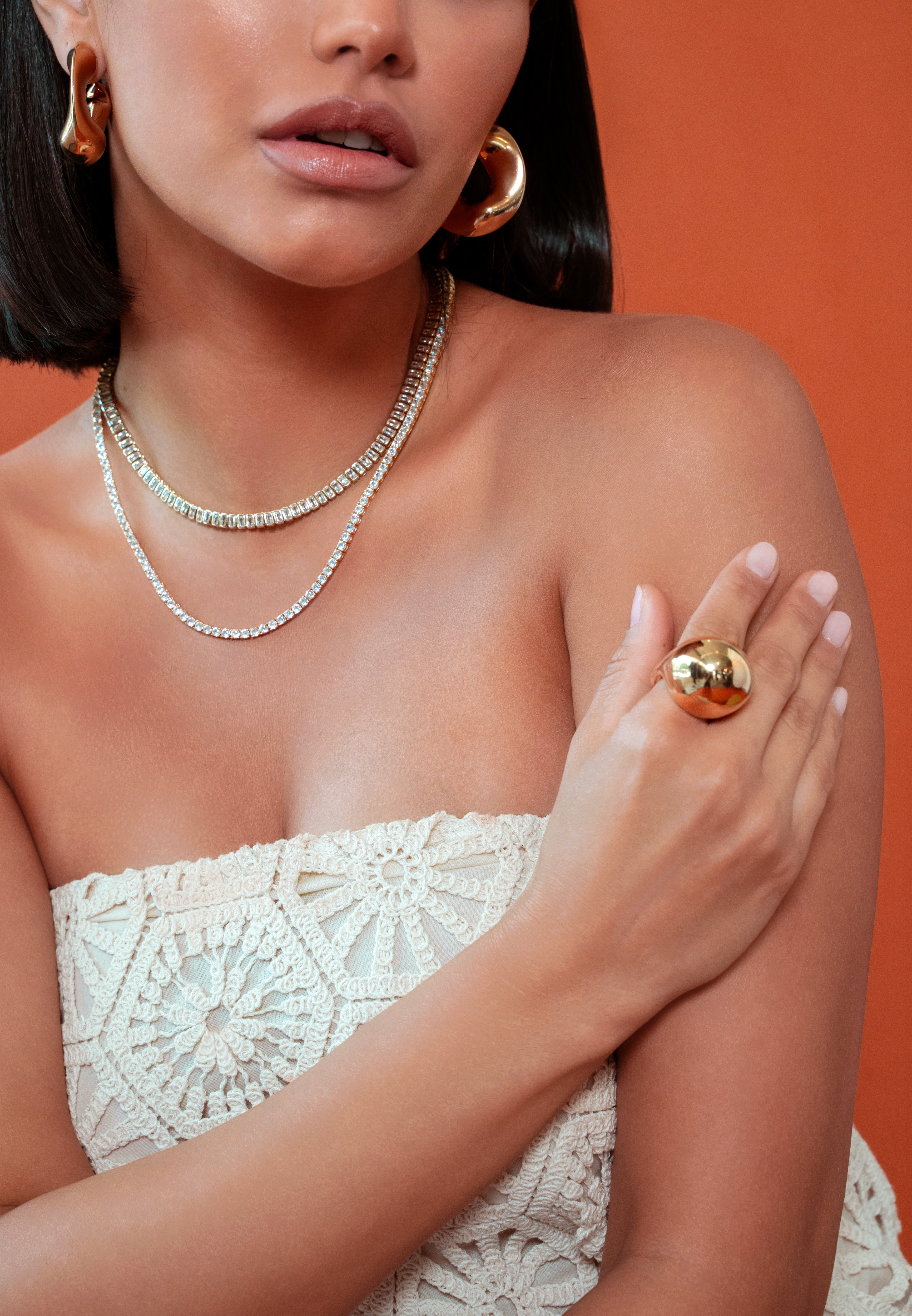 Oversize dome gold ring with high-polish finish, bold statement jewelry for modern style.