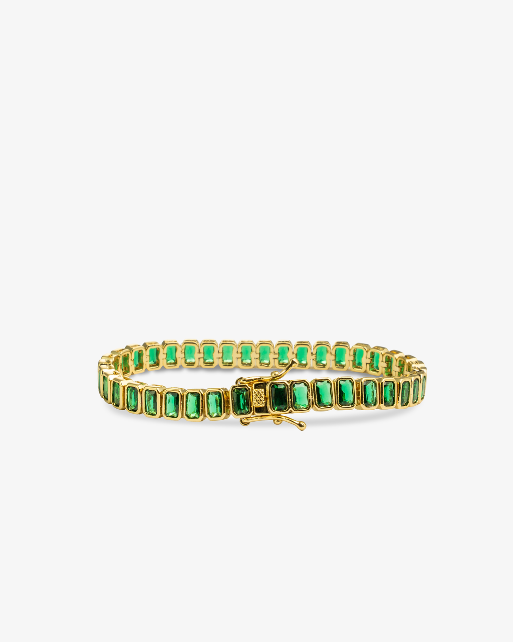 Green baguette-cut stone tennis bracelet, alone product shot on a plain background.