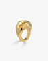 Gold chunky geometric faceted ring, alone product shot on a plain background.