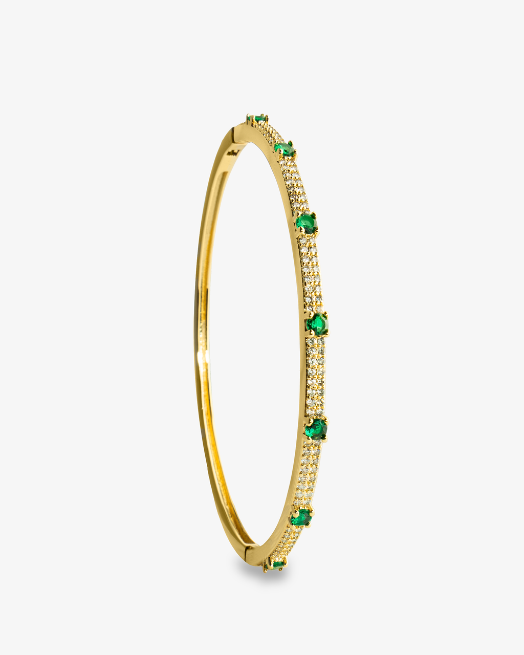 Gold thin bangle bracelet with colored stone detailing, alone product shot from another angle.