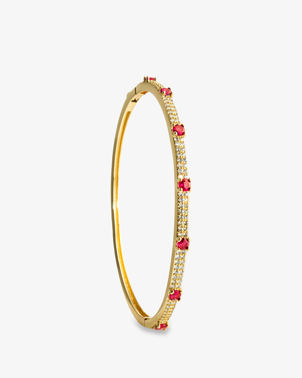 Gold thin bangle bracelet with colored stone detailing, alone product shot from another angle.