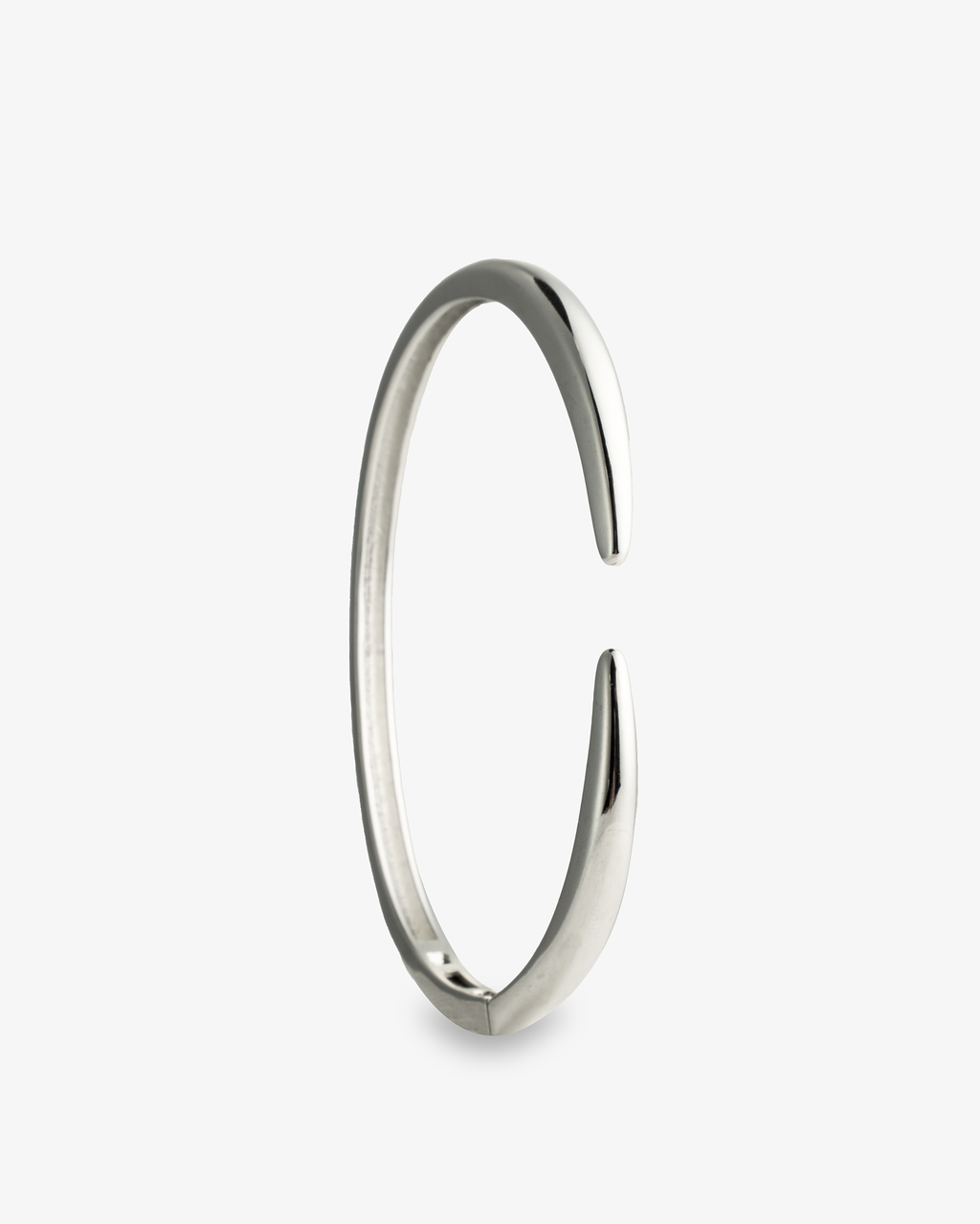 Silver slim open cuff bangle bracelet, alone product shot from a different angle.
