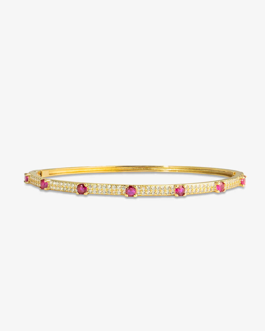 Gold thin bangle bracelet with pink simulated diamond stone detailing, alone product shot on a plain background.