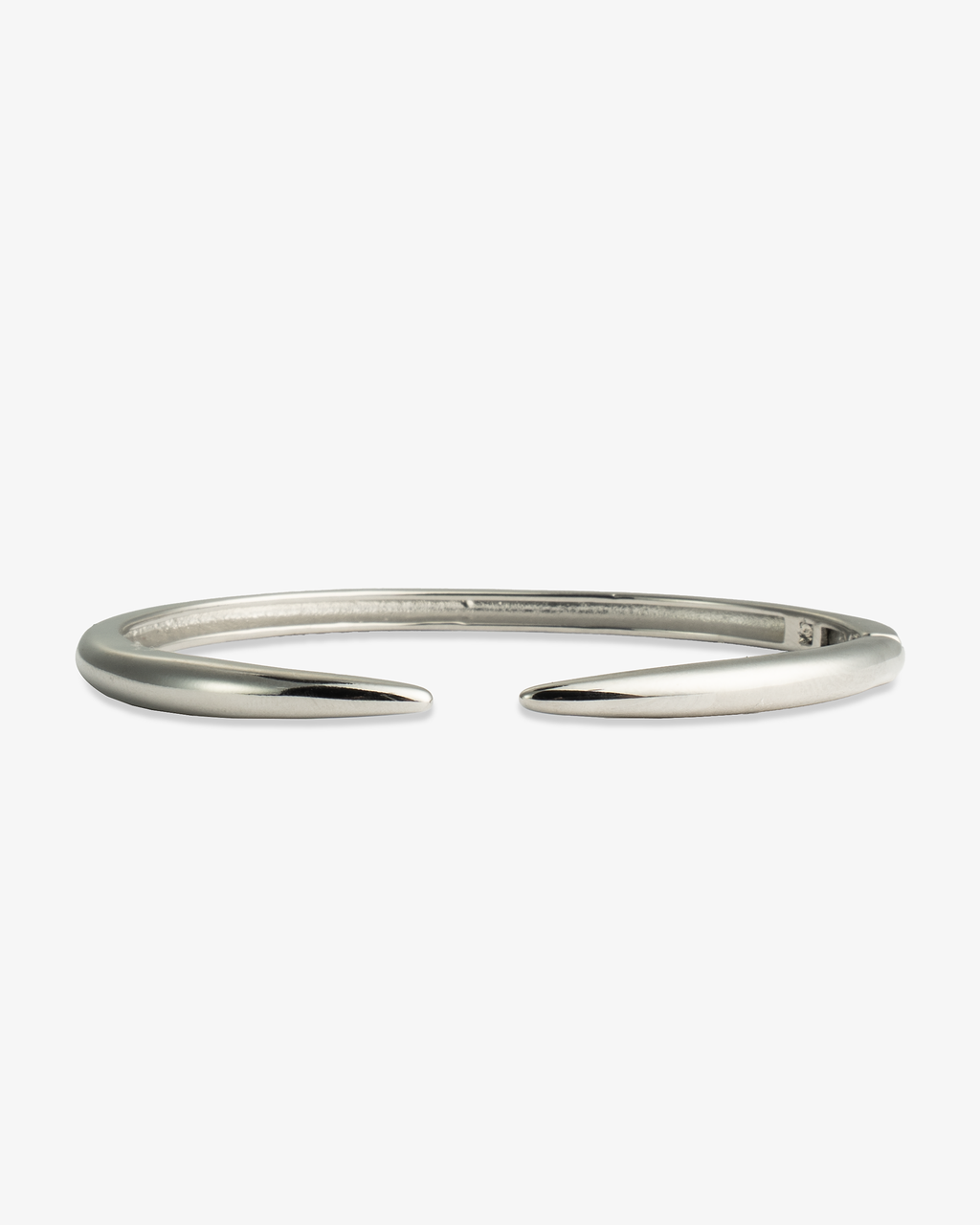 Silver slim open cuff bangle bracelet, alone product shot on a plain background.