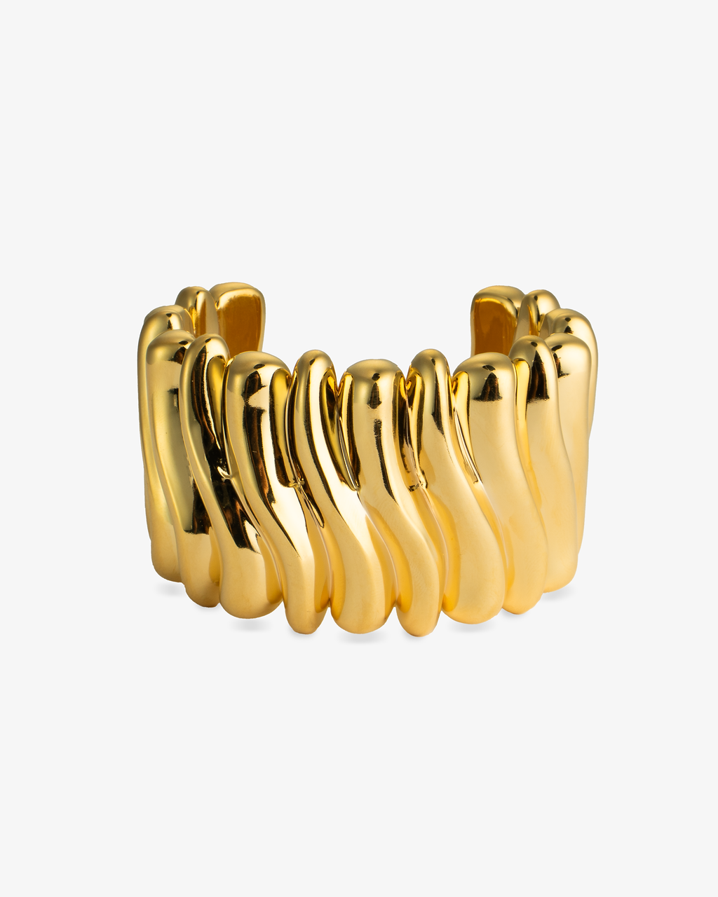 Gold chunky sculptural wavy open cuff bracelet, alone product shot showing the full textured ridges on a plain background.