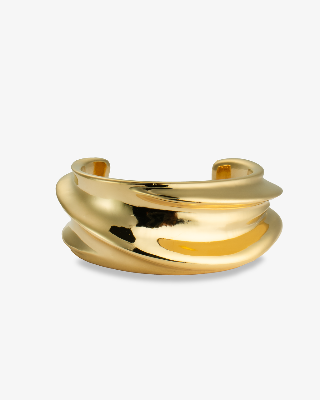 Gold chunky sculptural wave cuff bracelet, alone product shot from a different angle.