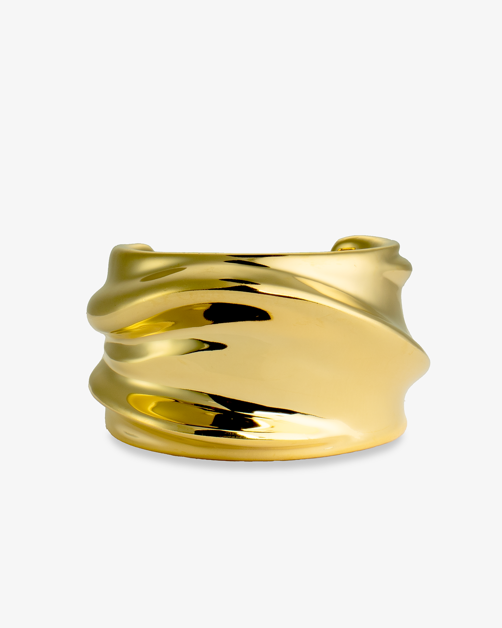 Gold wide sculptural statement cuff bracelet, alone product shot from a different angle.