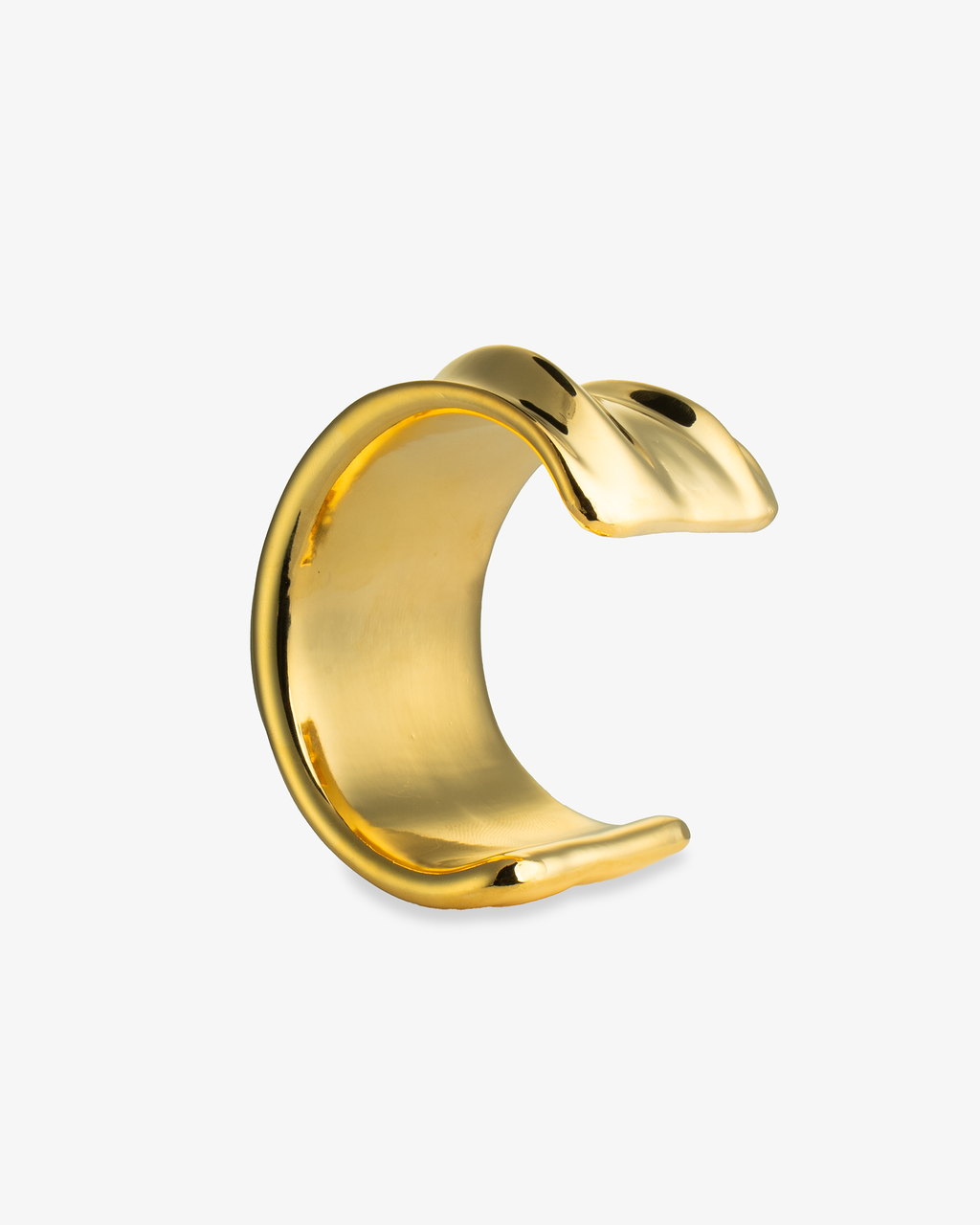 Gold wide sculptural statement cuff bracelet, alone product shot from a third angle.