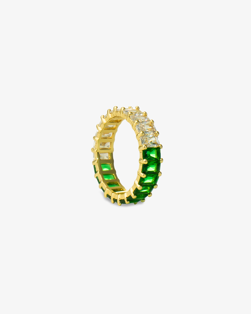 Gold eternity band ring with green simulated diamond stones, alone close-up product shot from a curved open angle.