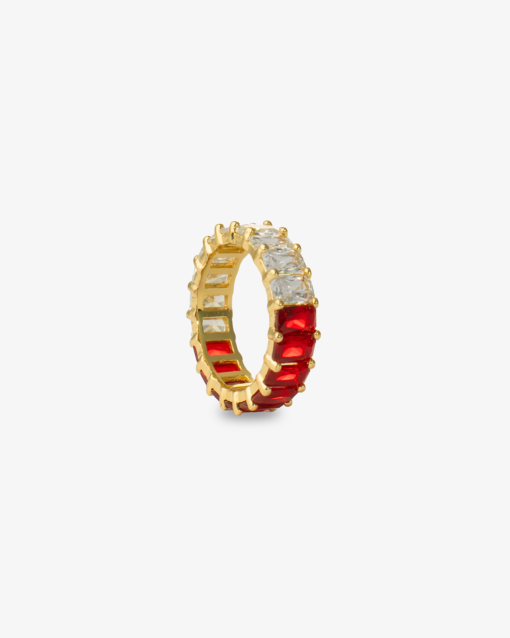 Gold eternity band ring with red simulated diamond stones, alone close-up product shot from a curved open angle.