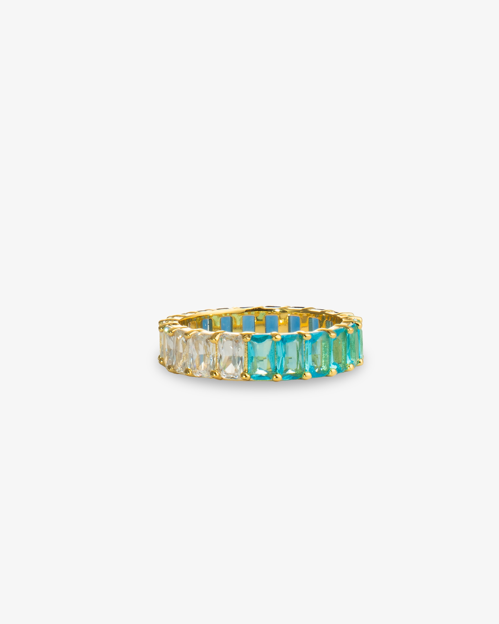 Gold eternity ring with teal-to-green ombre simulated diamond stones, alone close-up product shot.